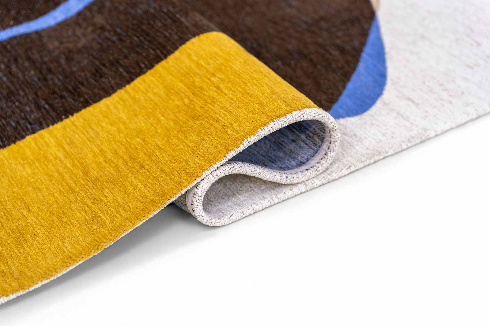 Louis De Poortere matto Gallery 2085 Stones Sunny Blue fold